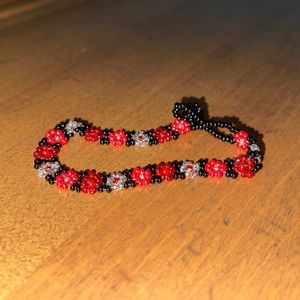 Red and black floral beaded bracelet